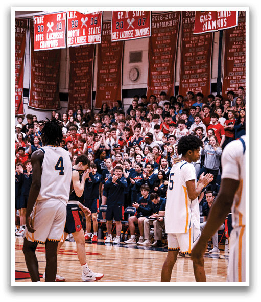 Basketball players on a court with a crowd watching. AI generated content