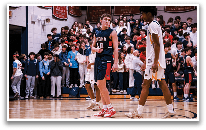 Two basketball players are walking on a court with a crowd of people watching. AI generated content