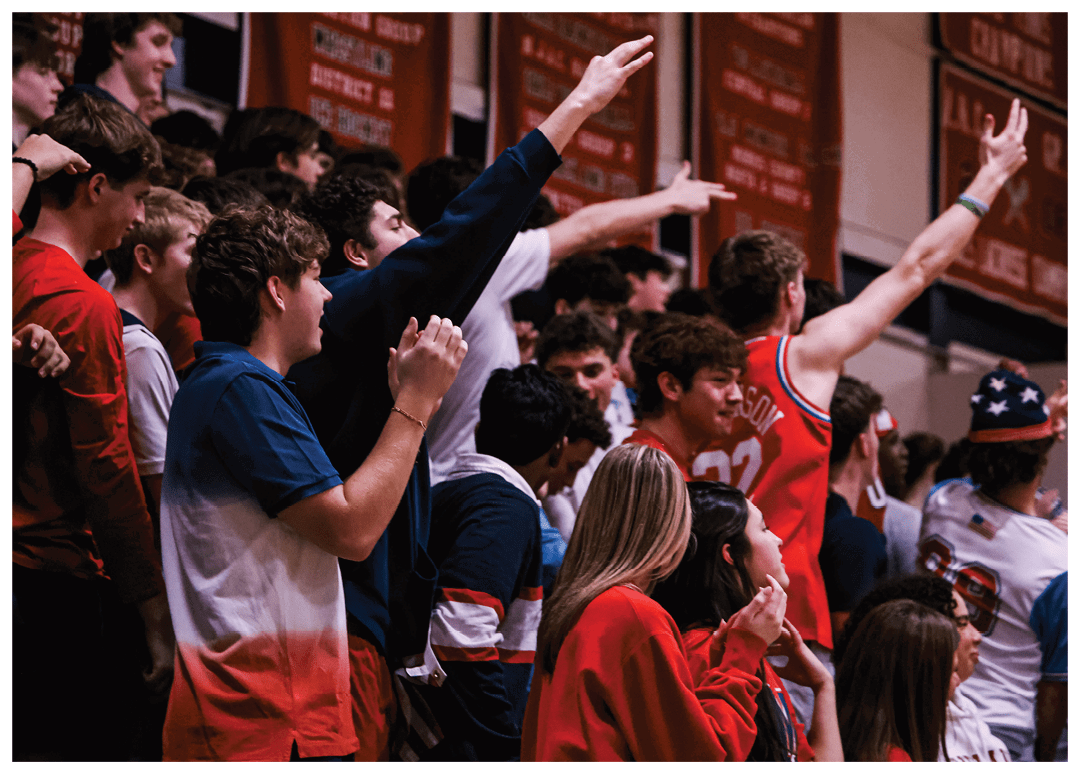 A group of people are sitting in the bleachers, watching a basketball game. AI generated content