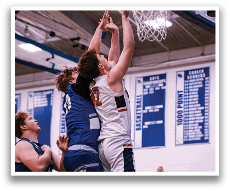 Two basketball players are fighting for a rebound, with one player jumping up to grab the ball. The crowd watches intently as the players compete for the ball. AI generated content