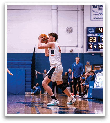 A basketball player in a white uniform is holding a basketball in his hands. AI generated content