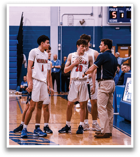 A group of men are standing on a basketball court, engaged in a conversation with a referee. AI generated content