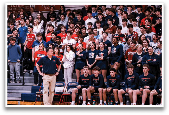 A man is speaking to a crowd of people in a gym. AI generated content