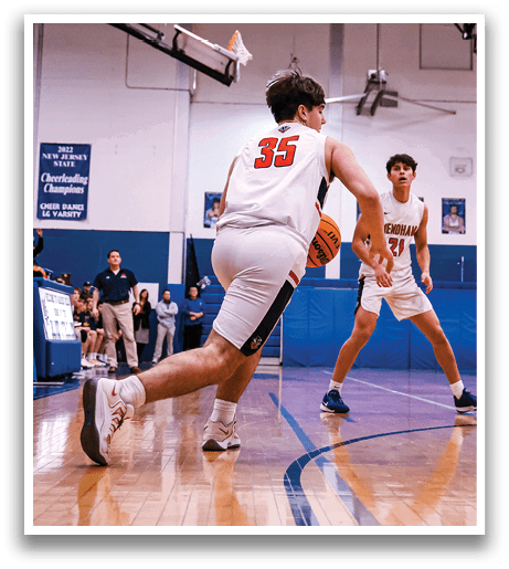 A group of men playing basketball on a court. AI generated content