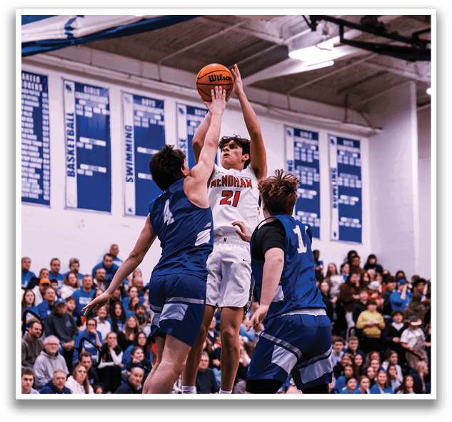 Basketball players are jumping for the ball in a game. AI generated content