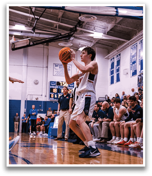 A basketball player is holding a ball in a gym. AI generated content