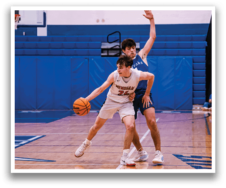 Two basketball players on a court, one with a ball and the other trying to block him. AI generated content