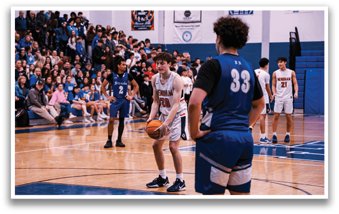 A group of people playing basketball, with one player holding a basketball. AI generated content