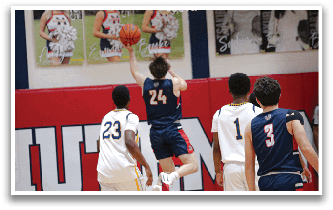 A basketball player is jumping to hit the ball, while two other players are watching. AI generated content