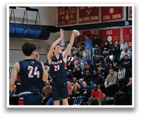 A basketball player is in the air, attempting to block a shot. AI generated content