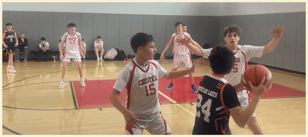 A group of young men playing basketball on a court. AI generated content