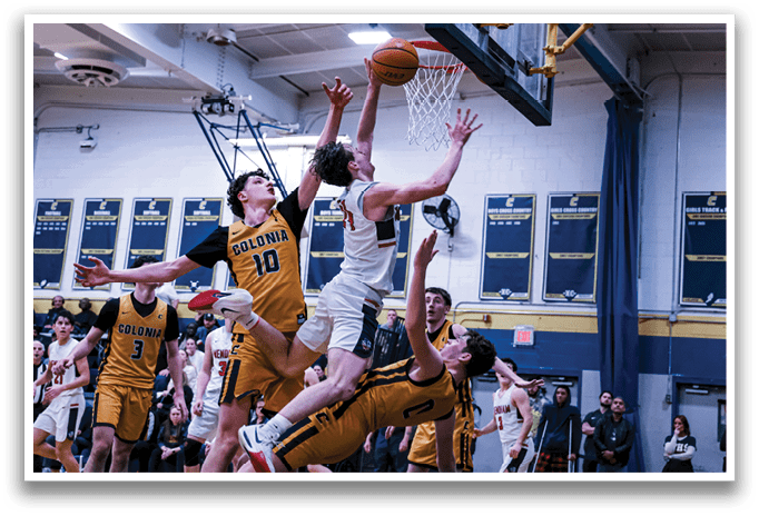 Two basketball players are fighting for the ball in the air, with one player attempting to block the other's shot. AI generated content