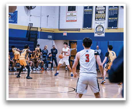 A group of people playing basketball on a court. AI generated content