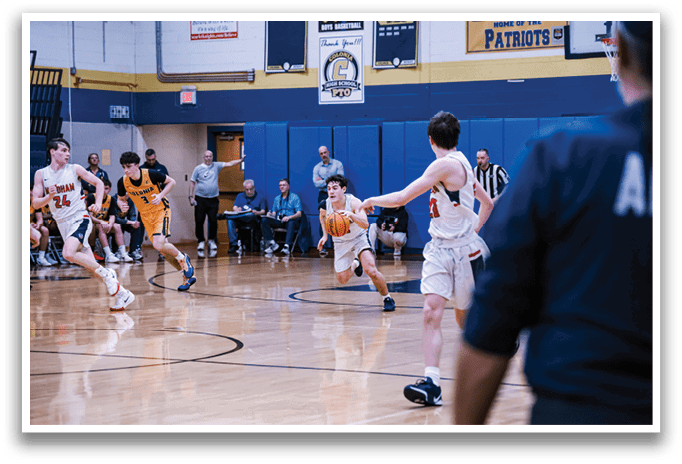 A group of people playing basketball on a court. AI generated content