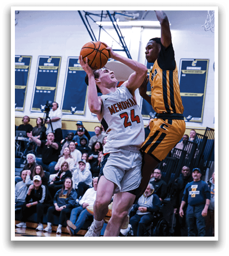 Two basketball players are fighting for the ball, both trying to gain possession. The crowd watches intently as the players jump in the air. AI generated content