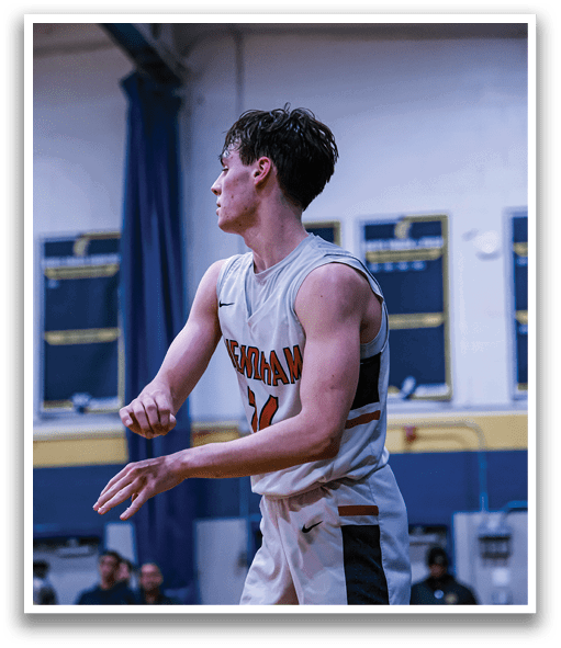 A basketball player wearing a number 11 jersey is standing on the court. AI generated content