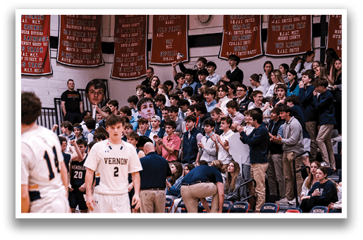 A group of people are watching a basketball game. AI generated content