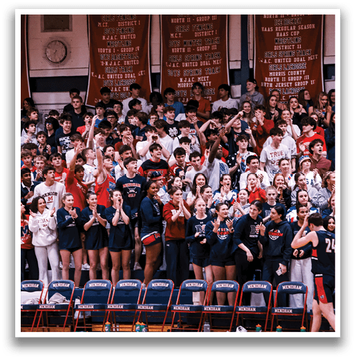 A large group of people are sitting in the bleachers, watching a game. AI generated content