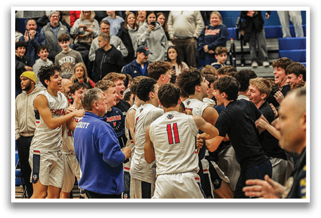 A group of people celebrating a victory on a basketball court. AI generated content