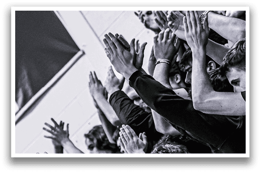 A group of people are clapping in a dark room. AI generated content