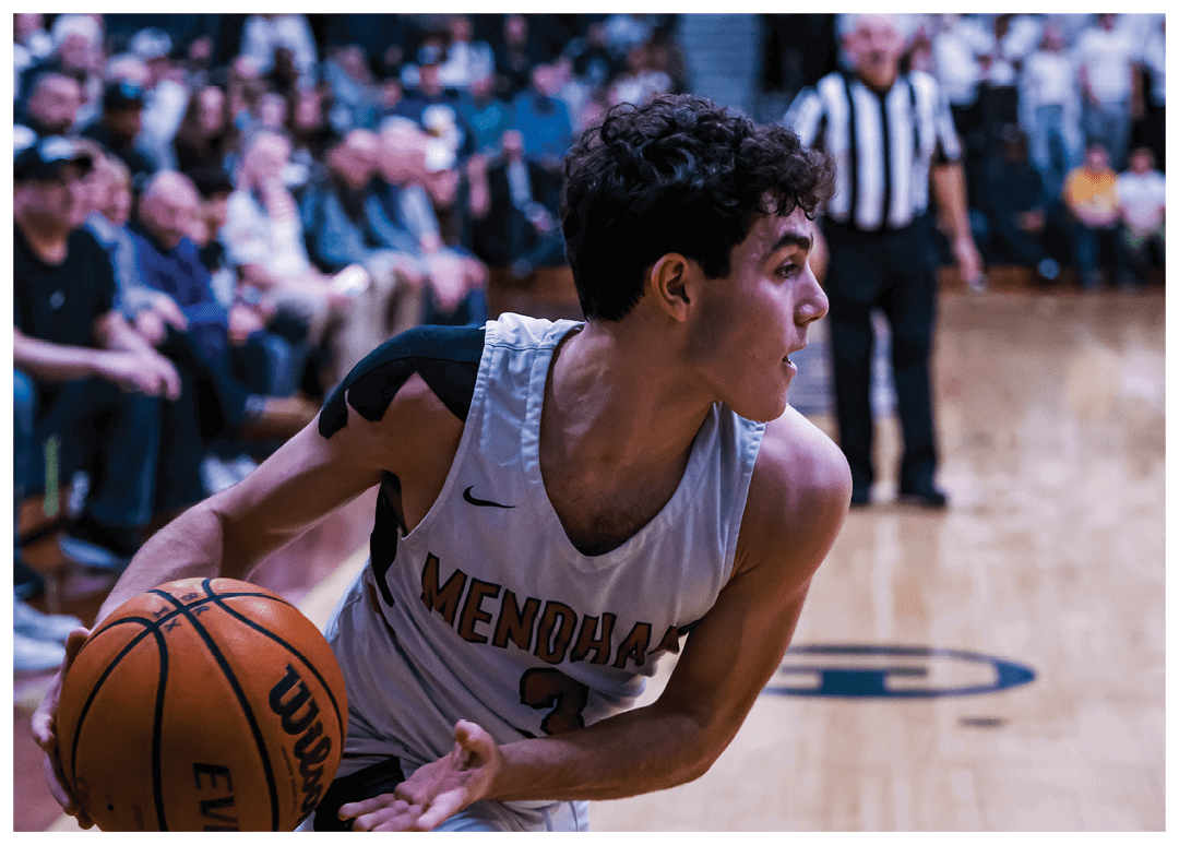A basketball player is holding a ball in front of a crowd of people. AI generated content