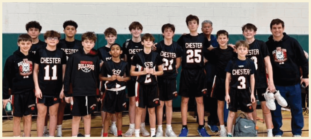 A group of young boys wearing black jerseys pose for a photo. AI generated content