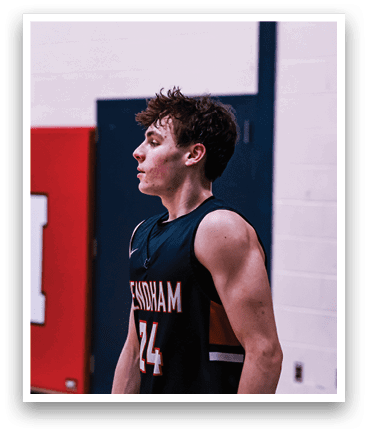 A basketball player wearing a black shirt with the number 44 on it stands in front of a red wall. AI generated content
