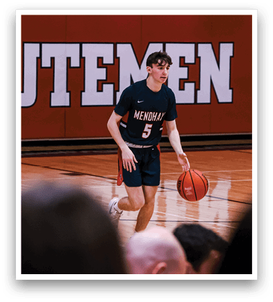 A basketball player is holding a basketball on the court. AI generated content