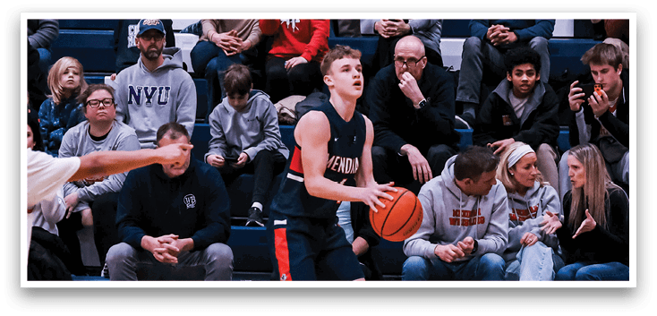 A basketball player is holding a basketball while walking on the court. AI generated content