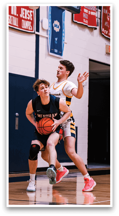 A basketball game is in progress with players on the court. A boy is holding a basketball and is about to shoot it. AI generated content