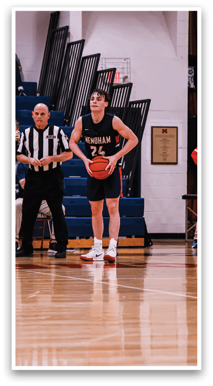 Basketball players on a court with a referee and a crowd watching. AI generated content