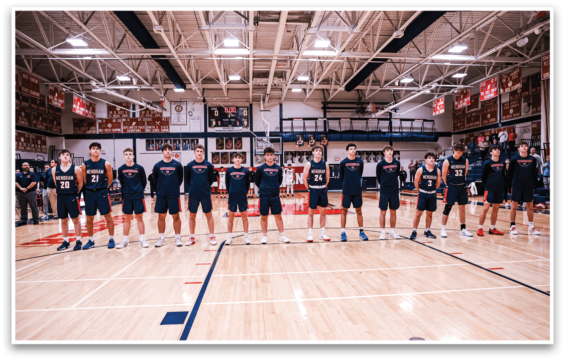 A group of young men wearing blue uniforms are standing on a basketball court. AI generated content