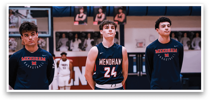 Four young men wearing blue shirts and shorts stand on a basketball court. AI generated content