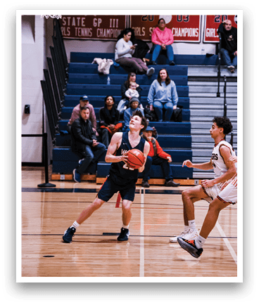 A group of people are playing basketball in a gym. AI generated content