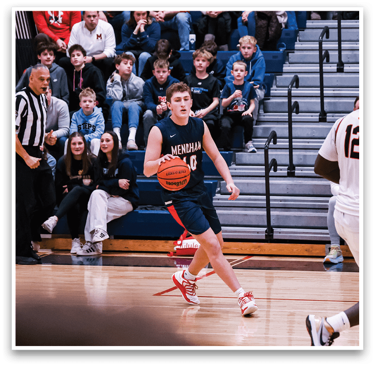 A basketball player in a black uniform is holding a basketball while walking on the court. AI generated content