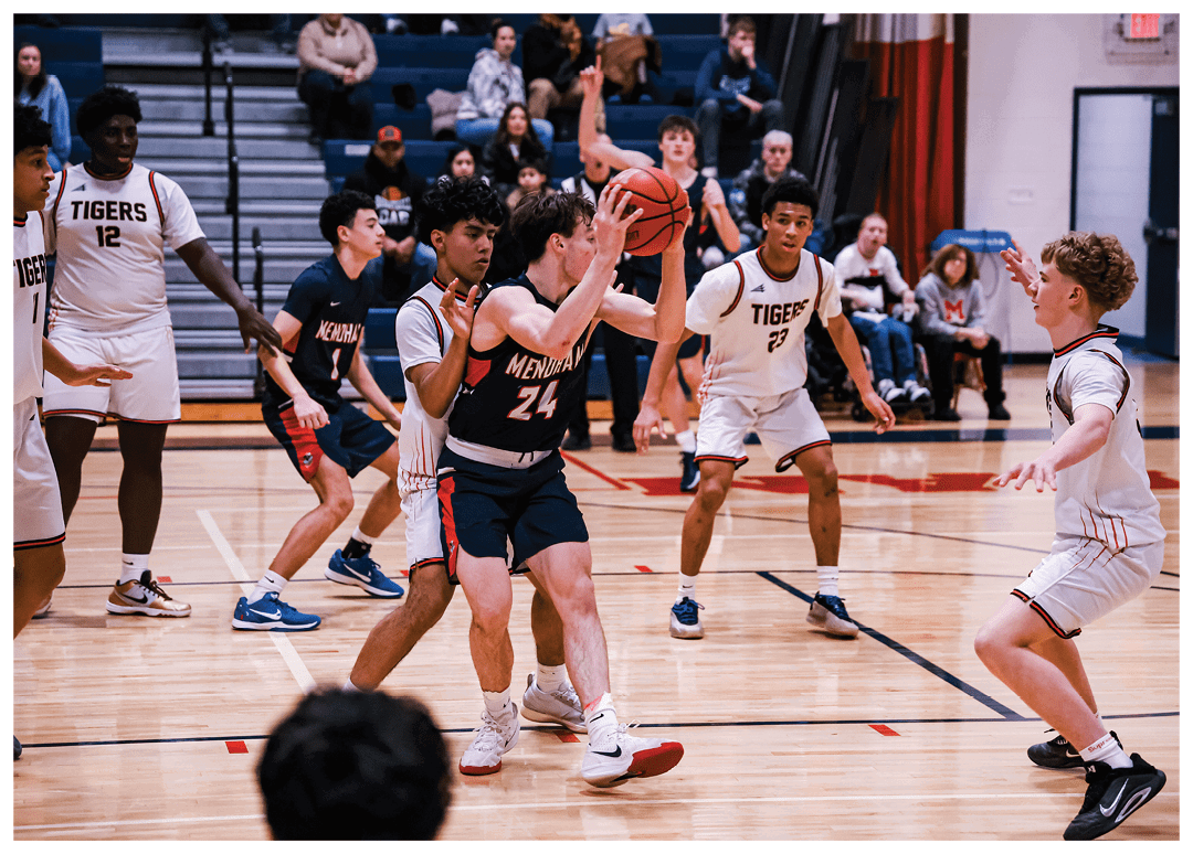 A group of young men playing basketball on a court. AI generated content