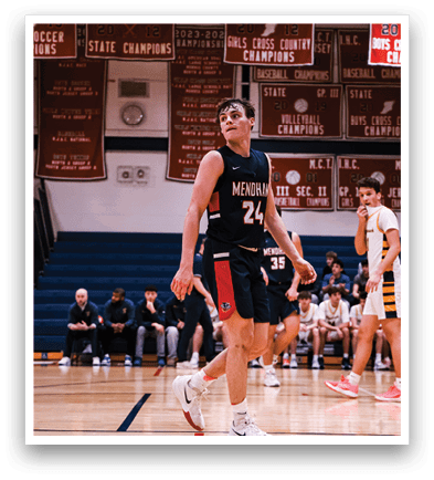 A basketball player wearing a black jersey with the number 22 on it is walking on the court. AI generated content