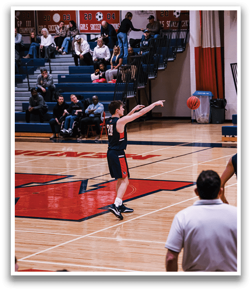 A basketball player is holding a ball and getting ready to throw it. AI generated content