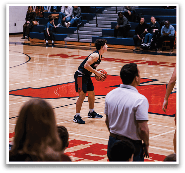 A basketball player is holding a ball on the court, surrounded by a crowd of people. AI generated content