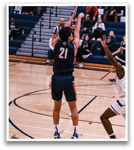 A basketball player in a blue uniform shoots a free throw during a game. AI generated content