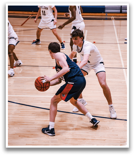Two men are playing basketball on a court, one of them is holding a basketball. AI generated content