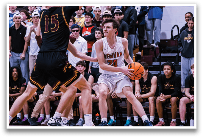 A basketball game is taking place with a player holding a basketball. AI generated content