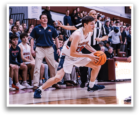 A basketball player is running with a ball in his hand, while a referee and other players watch. AI generated content