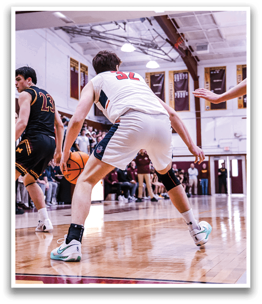 Two basketball players on a court, one with a ball and the other trying to block him. AI generated content