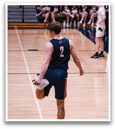 A basketball player wearing a number 7 jersey walks on the court. AI generated content