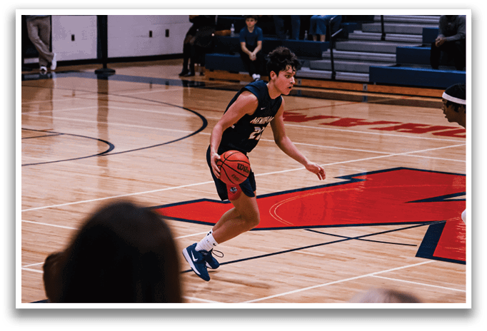 A basketball player in a black shirt and shorts is running with a basketball in his hands. AI generated content