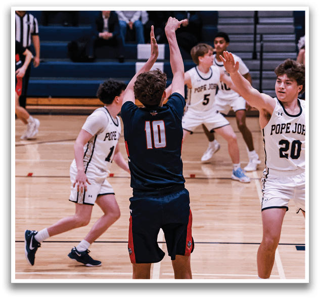 A basketball game is taking place with a player in a blue uniform holding up his hand. AI generated content