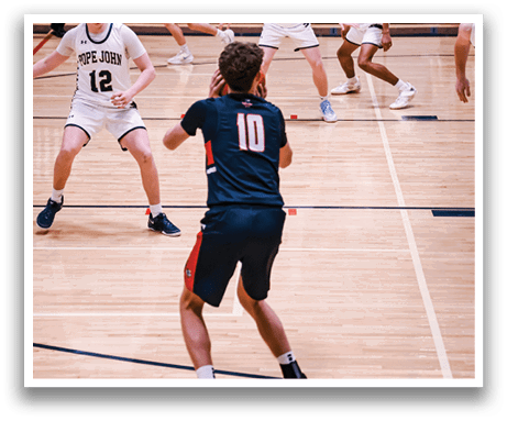 A group of young men playing basketball on a court. AI generated content
