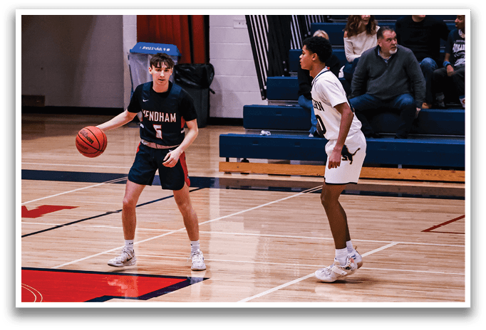 Two basketball players on the court, one holding a basketball. AI generated content