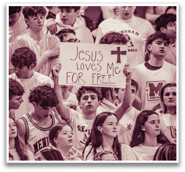 A group of people are gathered in a stadium, with one person holding a sign that says “Jesus loves me for free!" AI generated content